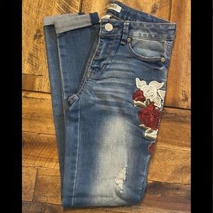 Girls Mudd jeans with embroidery detail. Size 12